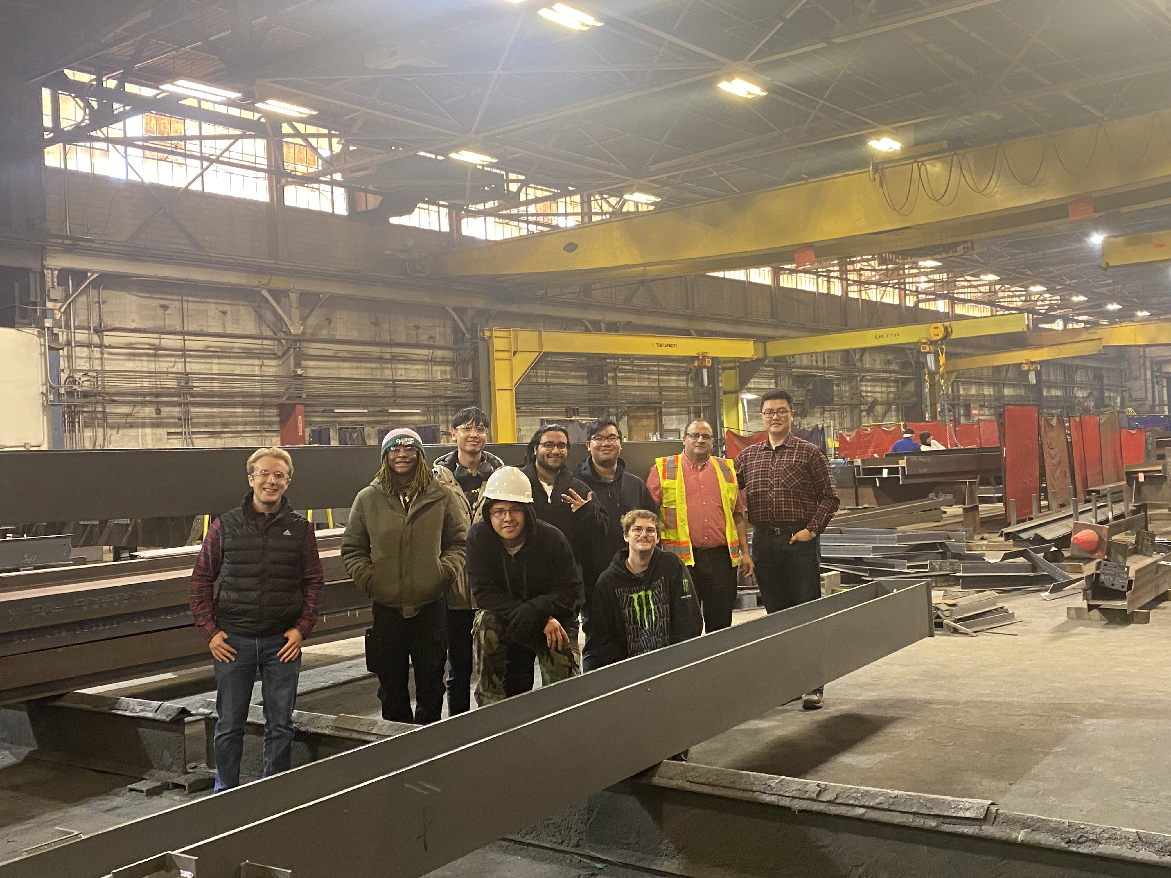 Students from University of Hartford gather in a group photo at United Steel, Inc.